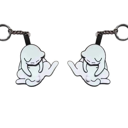 Playing with eggs and kitten keychain